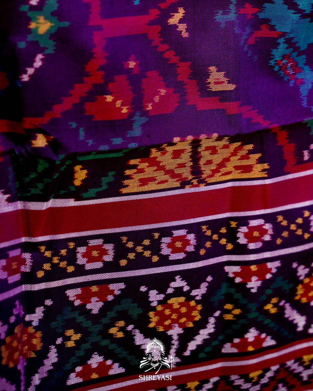 Handloom Pure Rajkot Patola Silk Saree with Animal & Floral Ikat Motifs