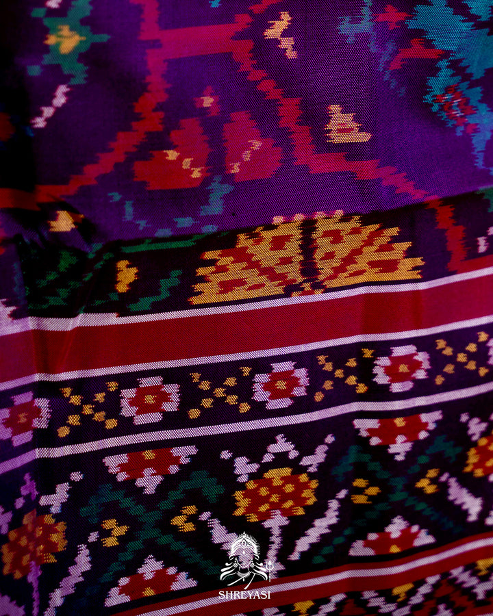 Handloom Pure Rajkot Patola Silk Saree with Animal & Floral Ikat Motifs