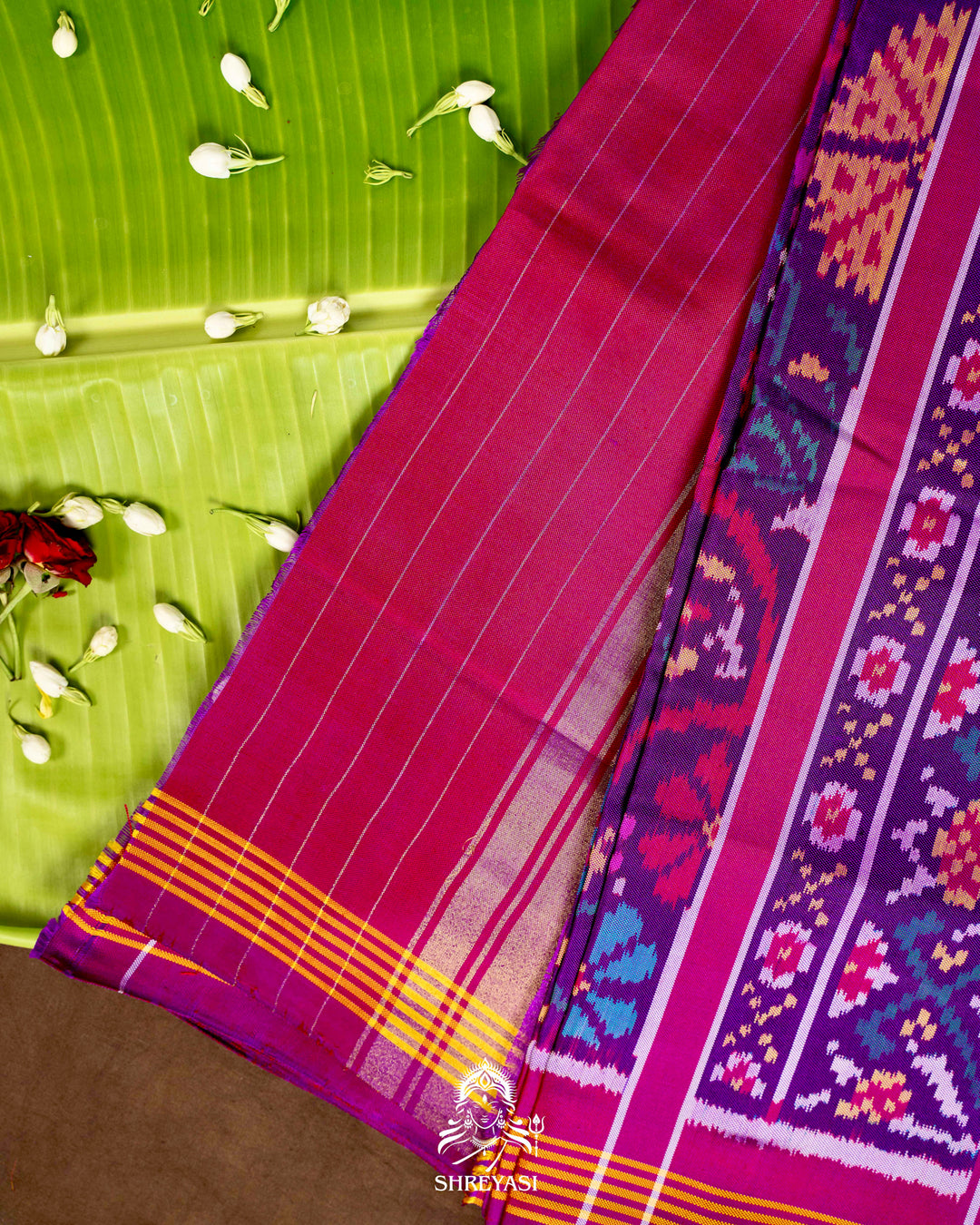 Handloom Pure Rajkot Patola Silk Saree with Animal & Floral Ikat Motifs