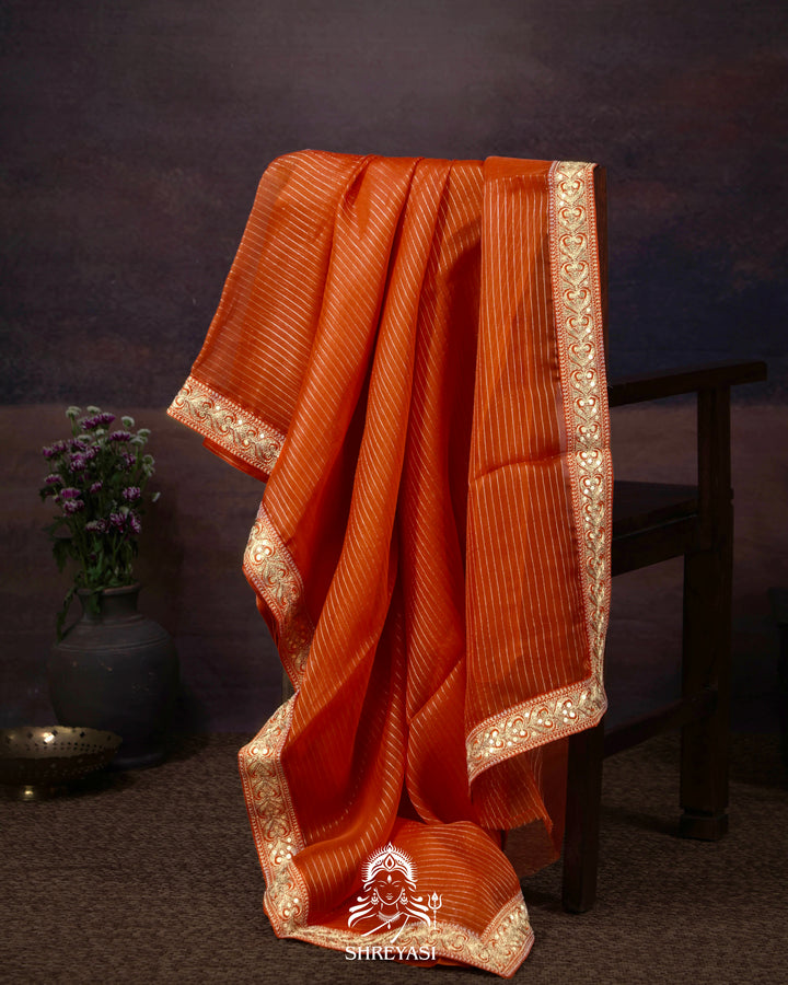 Pure Organza Silk Saree in Orange with Embroidered Border