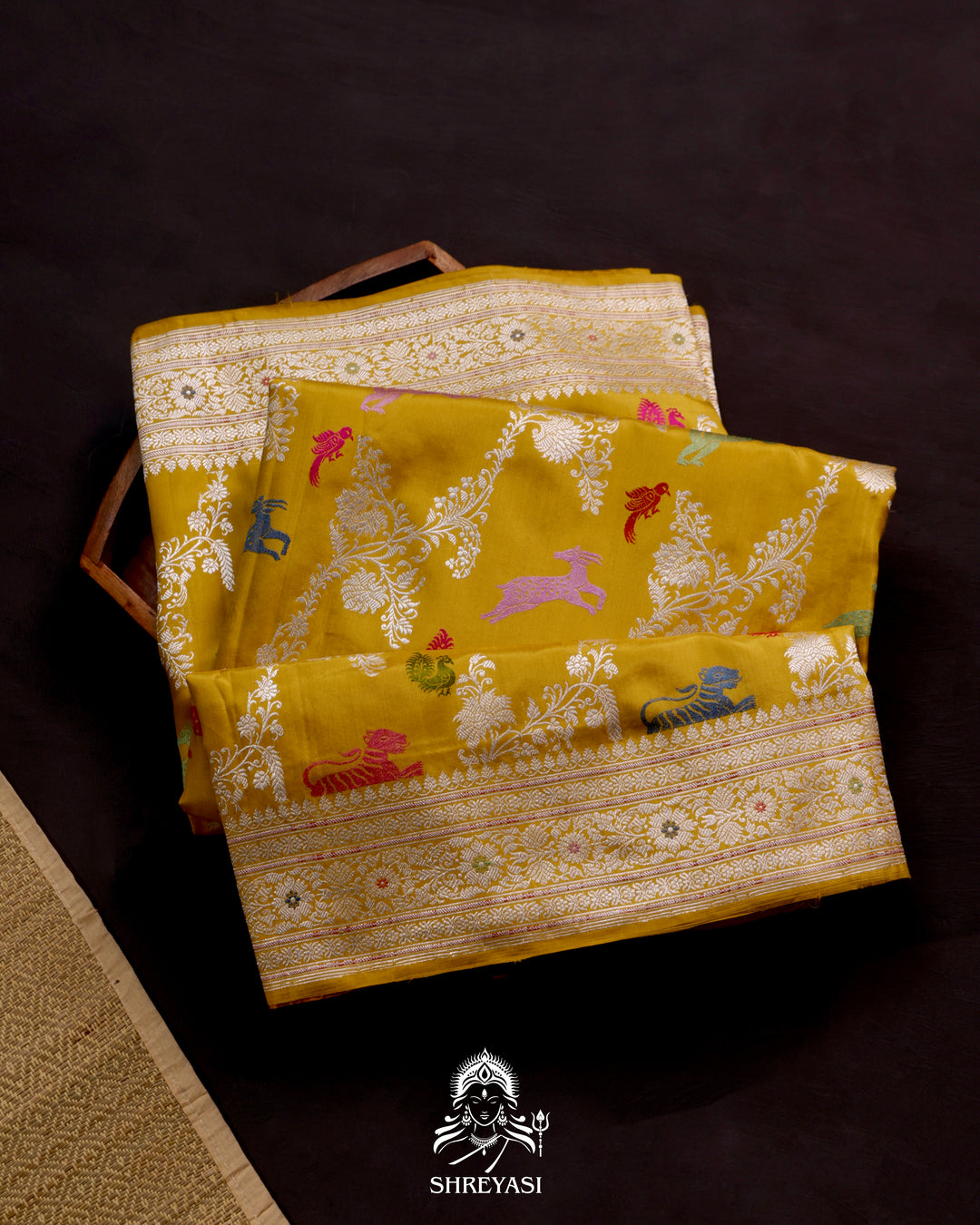 Banarasi Ektara silk saree in marigold yellow with kadhwa meenakari animal motifs and full zari border