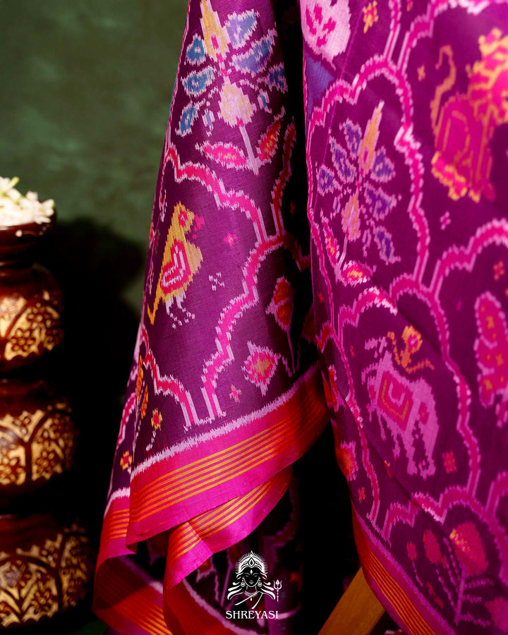 Handloom Rajkot Patola Silk Saree in Purple with Multicolor Ikat