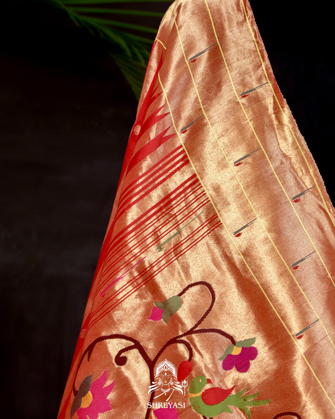Handloom pure Paithani silk saree with woven zari stripes, delicate bhutis, and traditional Paithani motif designer pallu in vibrant hues