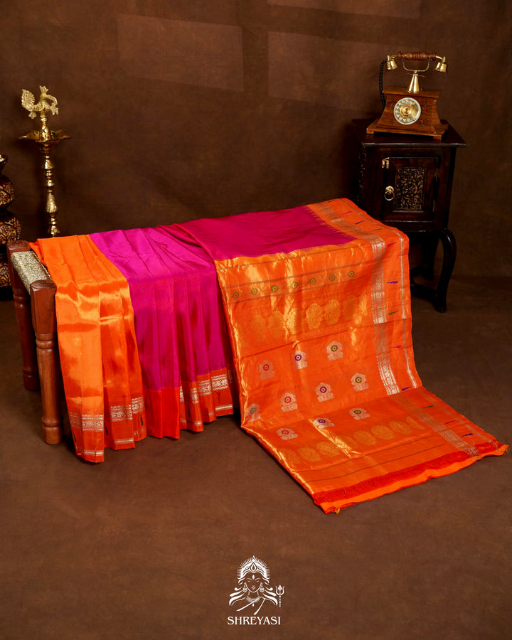Handloom Pure Gadwal Silk Saree in Rani Pink with Orange Tissue Muniya Border