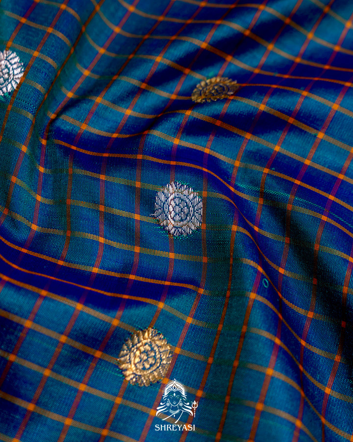 Handloom Pure Gadwal Silk Saree
in Kuttu Weaving and Rich Zari Pallu
