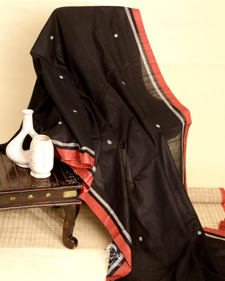 Handloom Bawan Buta cotton saree featuring traditional Jamdani woven motifs and contrast borders