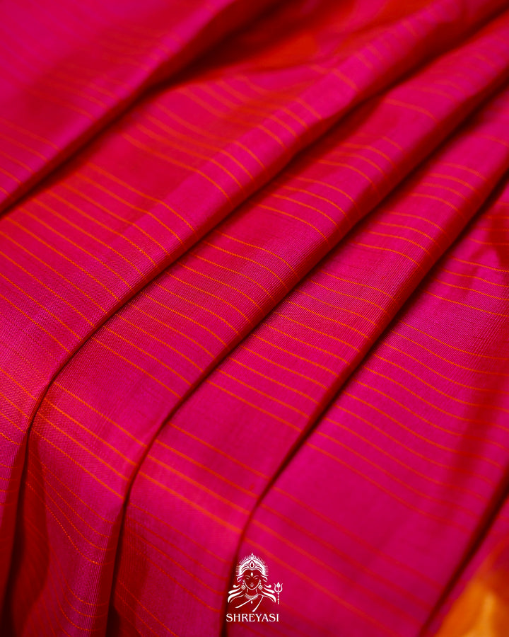 Handloom Pure Gadwal Silk Saree in Rani Pink with Orange Tissue Muniya Border