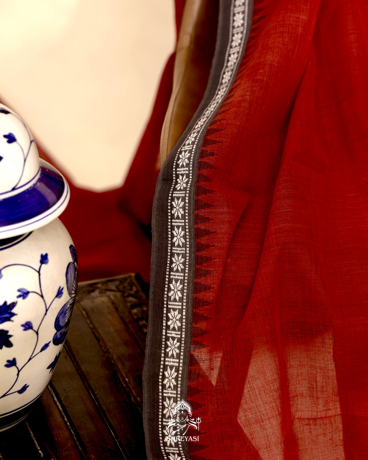Handloom Bawan Buta cotton saree with contrast borders and a soft breathable drape