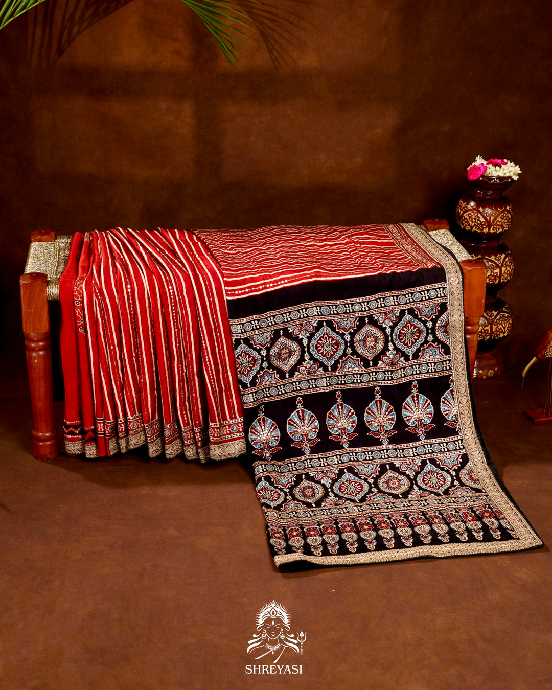 Handloom Pure Modal Silk Ajrakh Hand Block Printed Saree with Natural Dyes, All Over Aari Embroidery & Embroidered Borders
