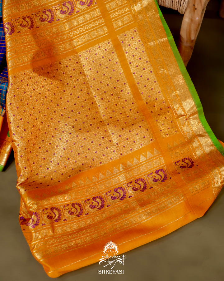 Handloom Pure Gadwal Silk Saree
in Kuttu Weaving and Rich Zari Pallu