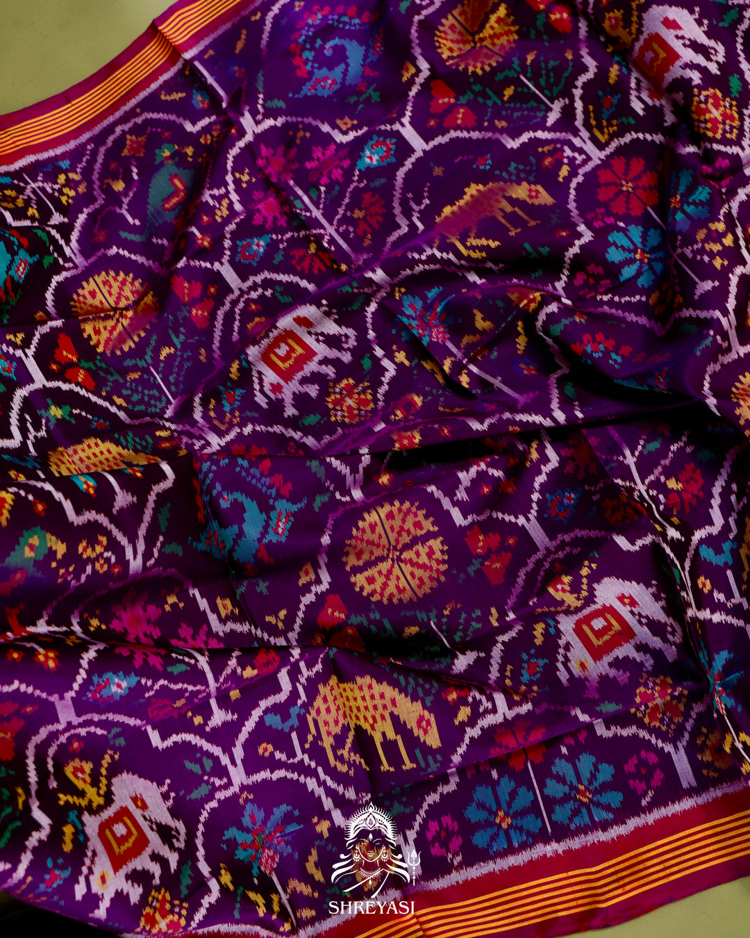 Handloom Rajkot Patola Silk Saree in Deep Violet with Multicolor Ikat