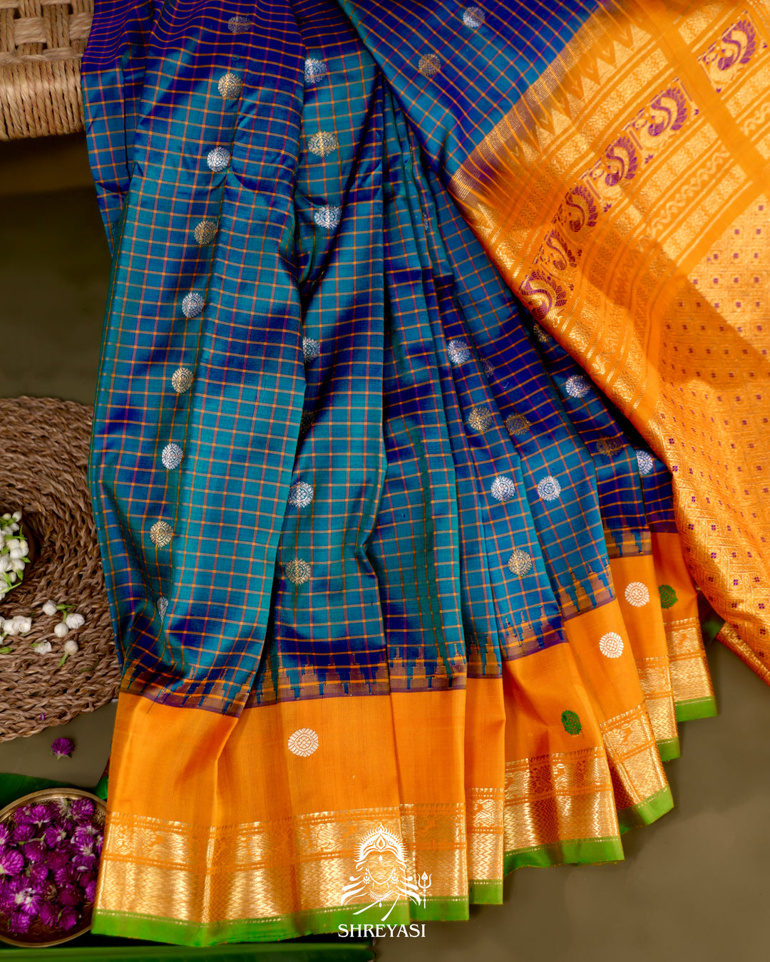 Handloom Pure Gadwal Silk Saree
in Kuttu Weaving and Rich Zari Pallu