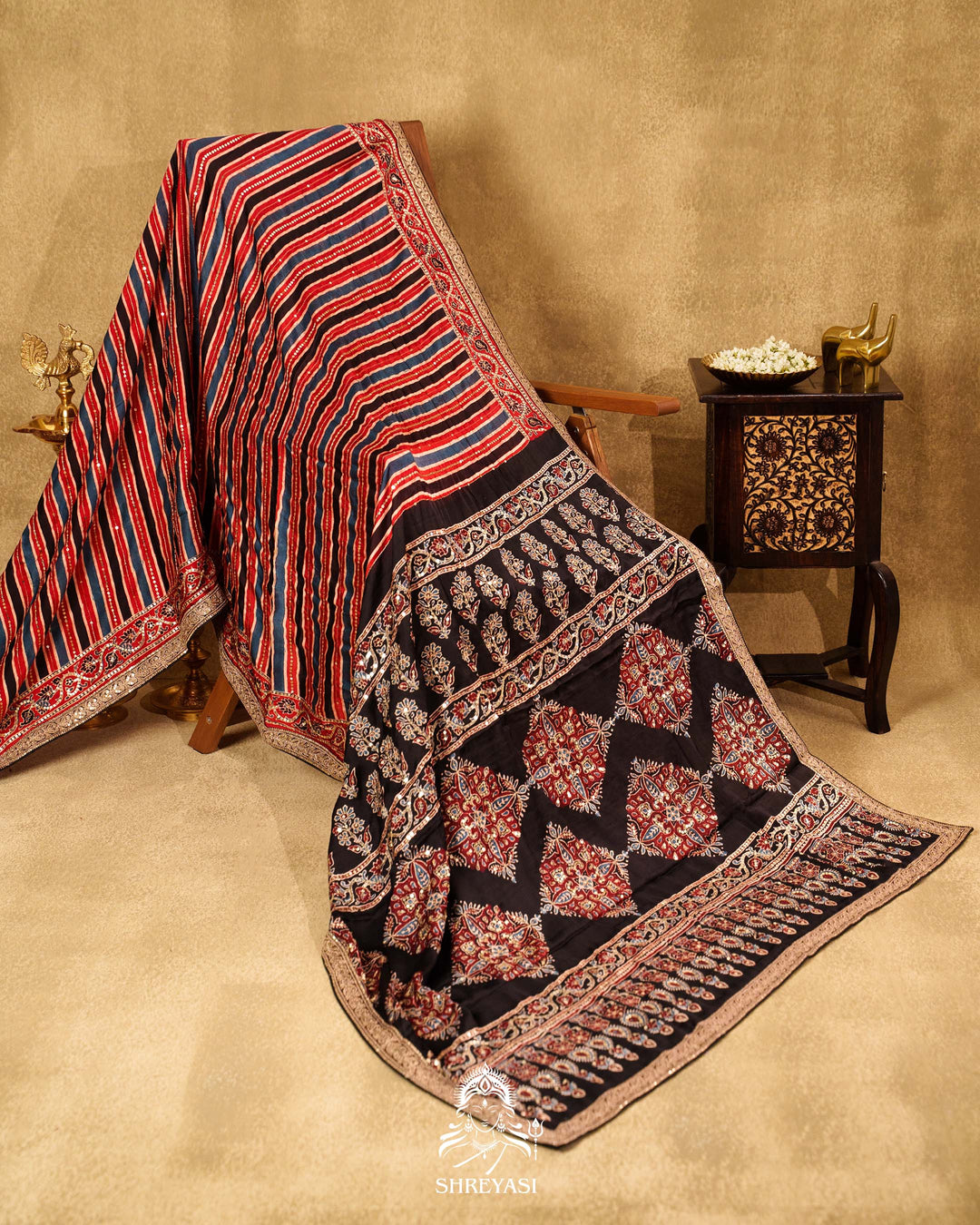 Handloom Pure Modal Silk Ajrakh Hand Block Printed Saree with Natural Dyes, All Over Aari Embroidery & Embroidered Borders