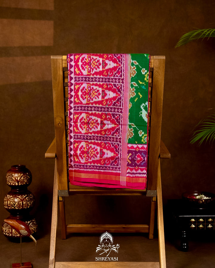 Handloom Pure Rajkot Patola Silk Saree in Emerald Green with Animal & Floral Ikat Motifs
