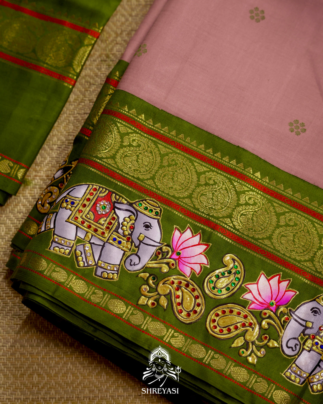 Handloom Pure Kanjivaram Silk Saree in Real Zari with Tanjore Yanai and Kamalam Artwork