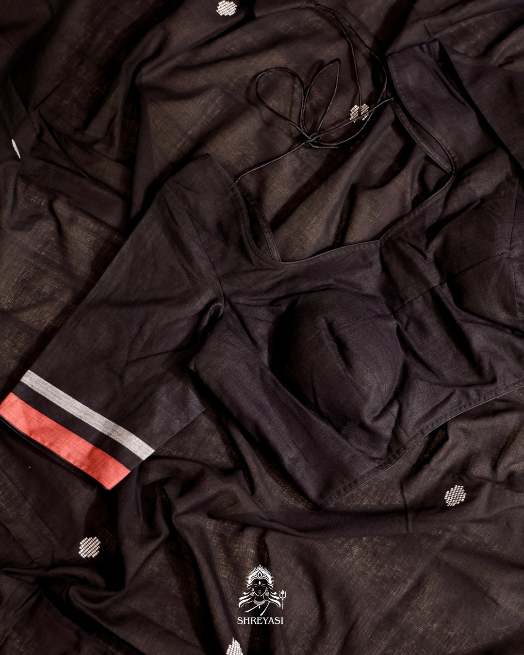 Handloom Bawan Buta cotton saree featuring traditional Jamdani woven motifs and contrast borders