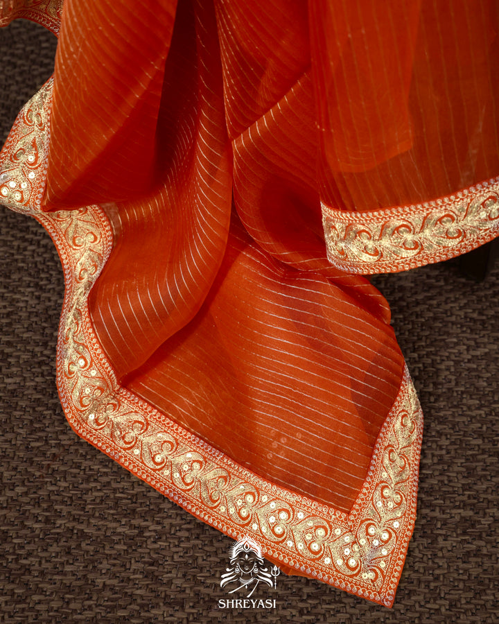 Pure Organza Silk Saree in Orange with Embroidered Border