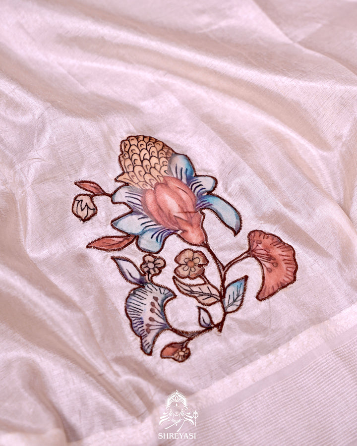 Kota saree with floral kalamkari appliqué work, contrast border, and lightweight breathable drape