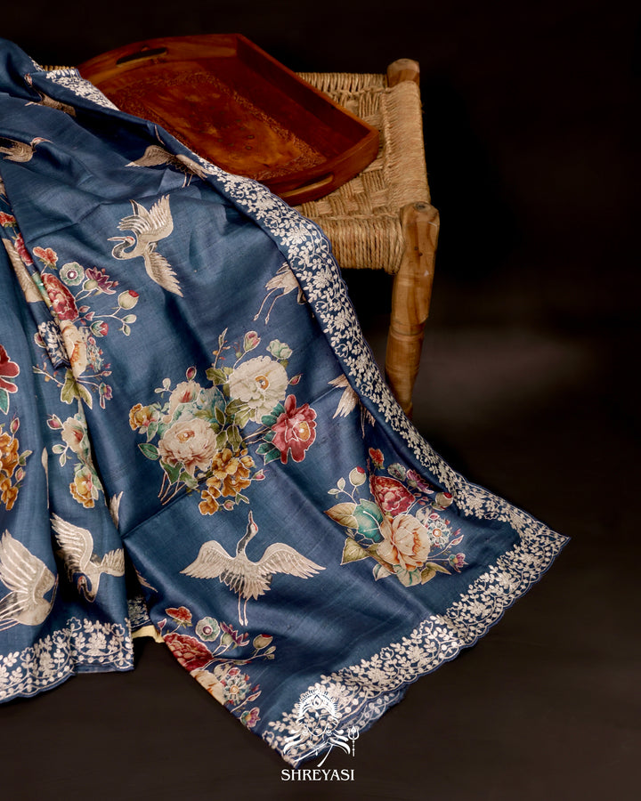 Pallu with embroidered floral bouquets and bird motifs on tussar silk saree