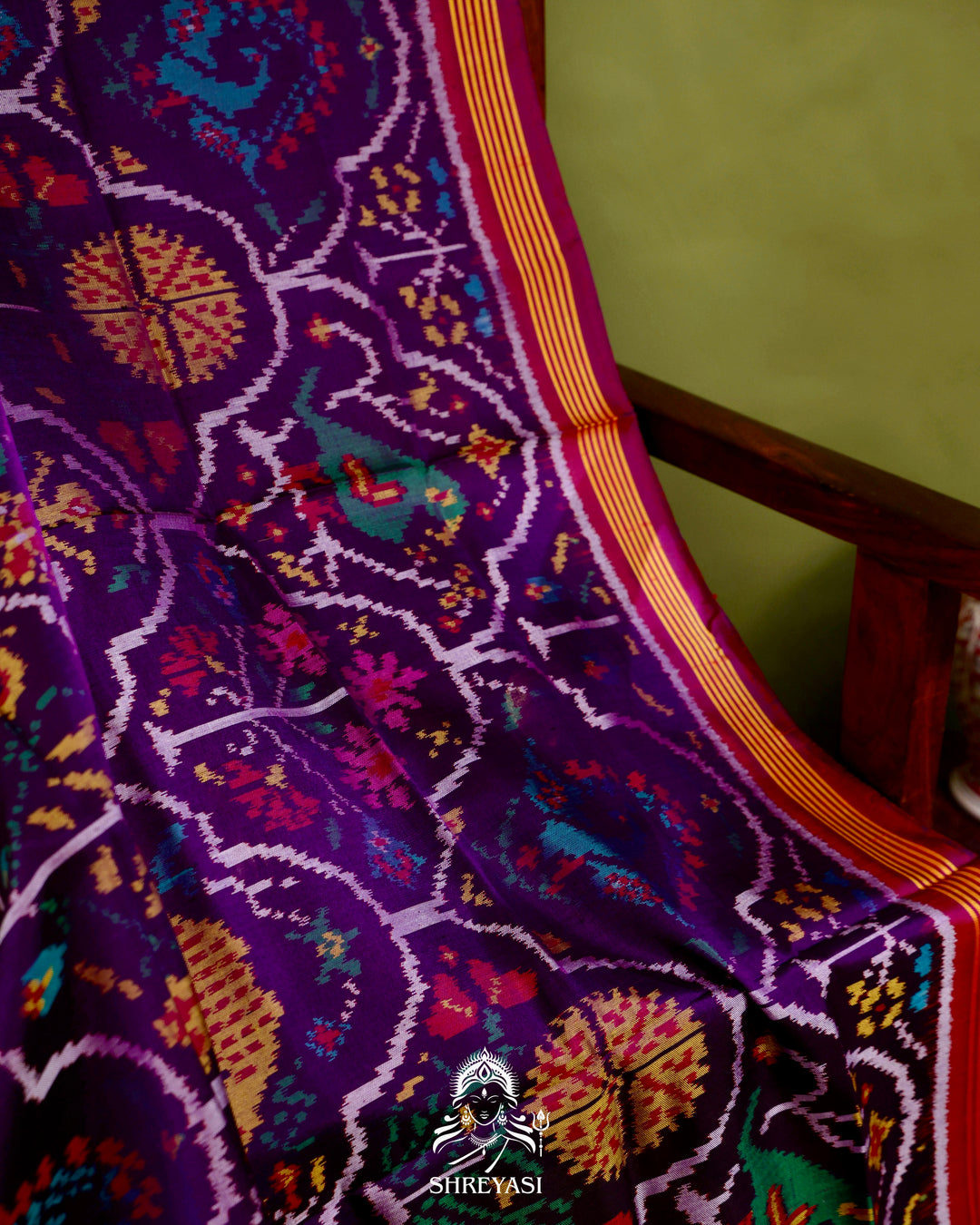 Handloom Rajkot Patola Silk Saree in Deep Violet with Multicolor Ikat
