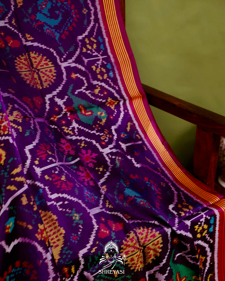 Handloom Rajkot Patola Silk Saree in Deep Violet with Multicolor Ikat