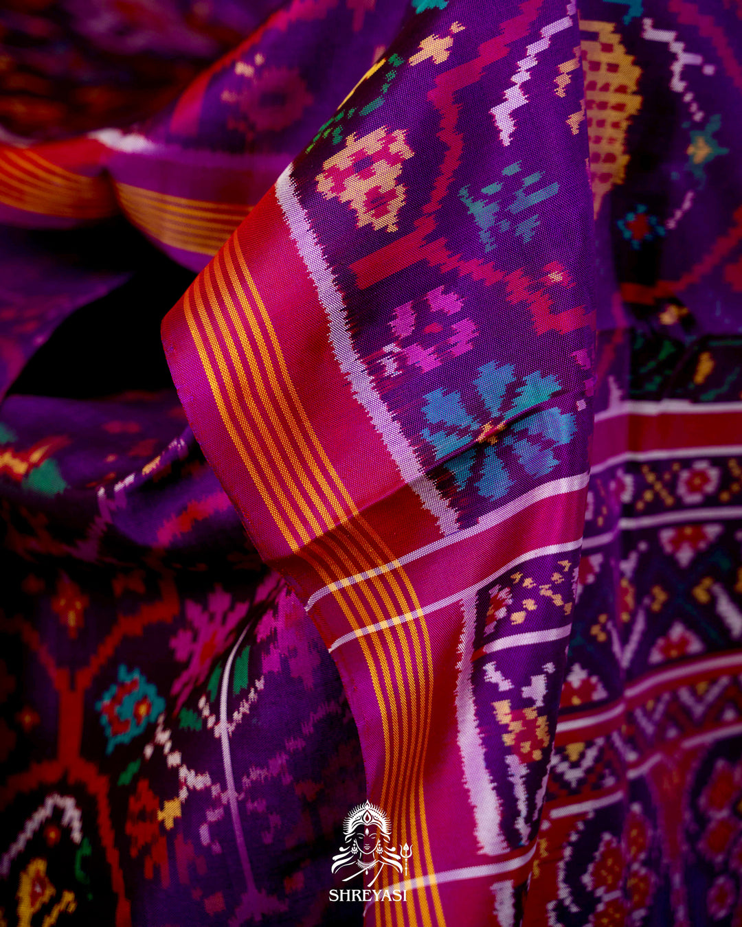 Handloom Pure Rajkot Patola Silk Saree with Animal & Floral Ikat Motifs