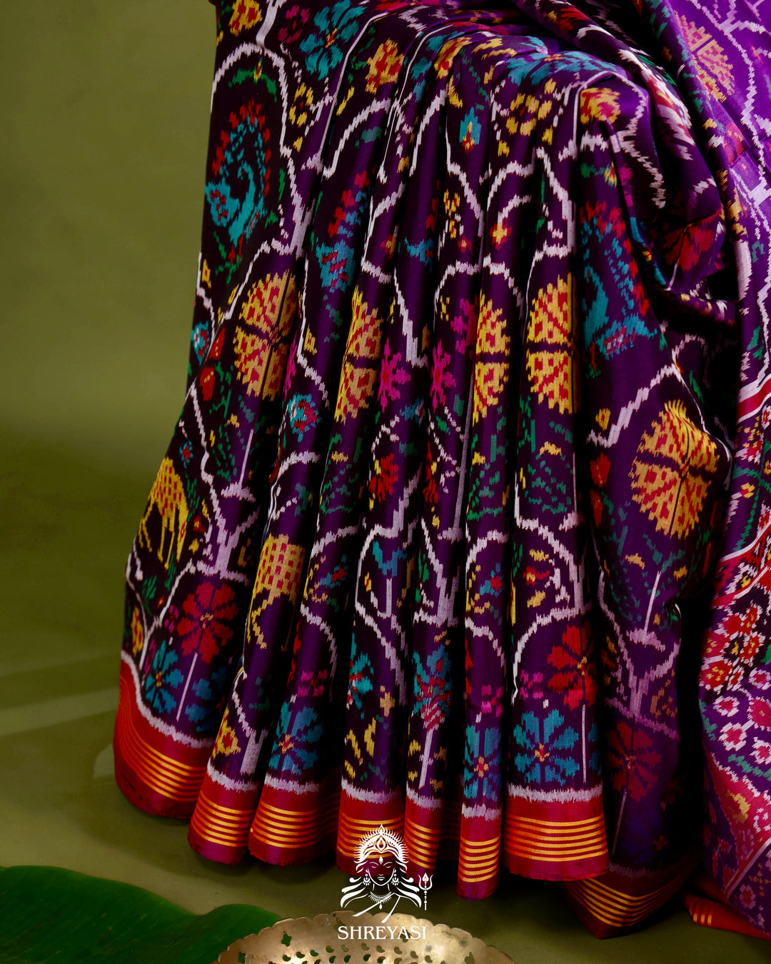 Handloom Rajkot Patola Silk Saree in Deep Violet with Multicolor Ikat