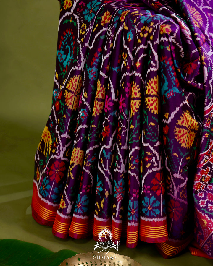 Handloom Rajkot Patola Silk Saree in Deep Violet with Multicolor Ikat