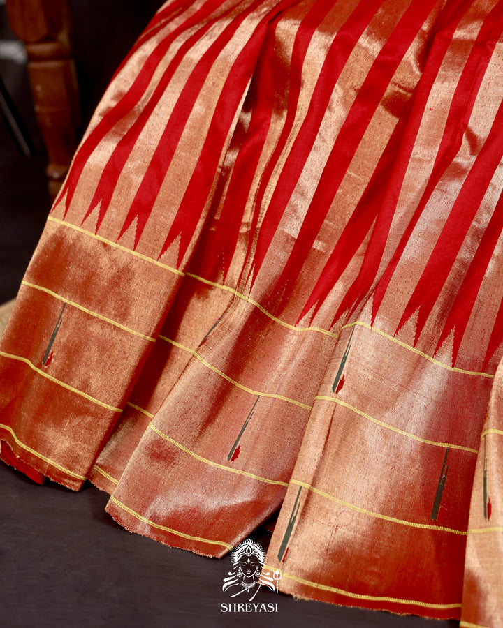Handloom pure Paithani silk saree with woven zari stripes, delicate bhutis, and traditional Paithani motif designer pallu in vibrant hues