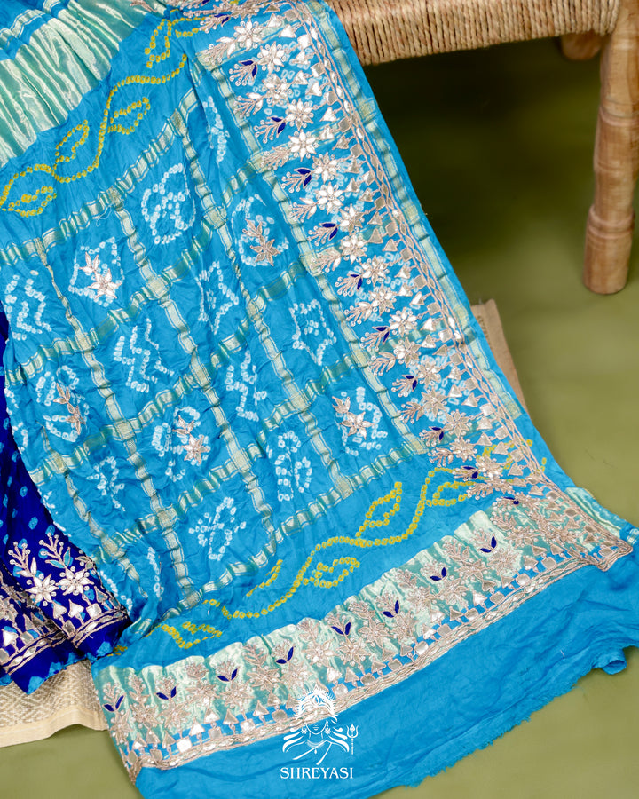 Handloom Pure Gaji Silk Saree with Hand-Knotted Bandhej and Gharchola Pallu with Heavy Gotapatti Embroidery