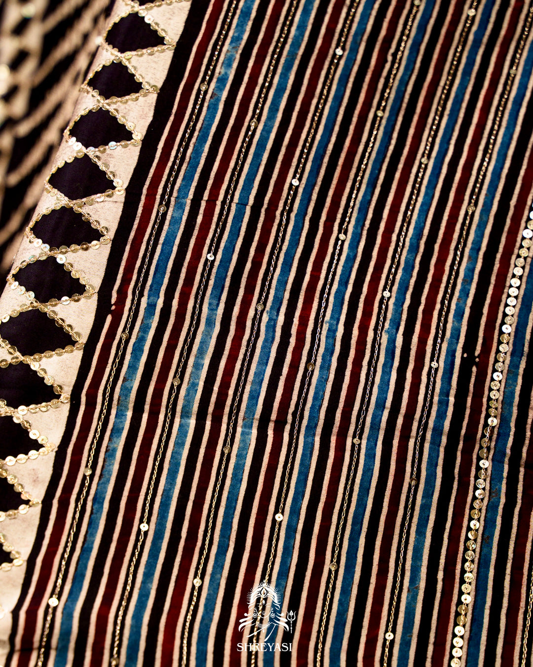 Handloom Pure Modal Silk Ajrakh Hand Block Printed Saree with Natural Dyes, All Over Aari Embroidery & Embroidered Borders
