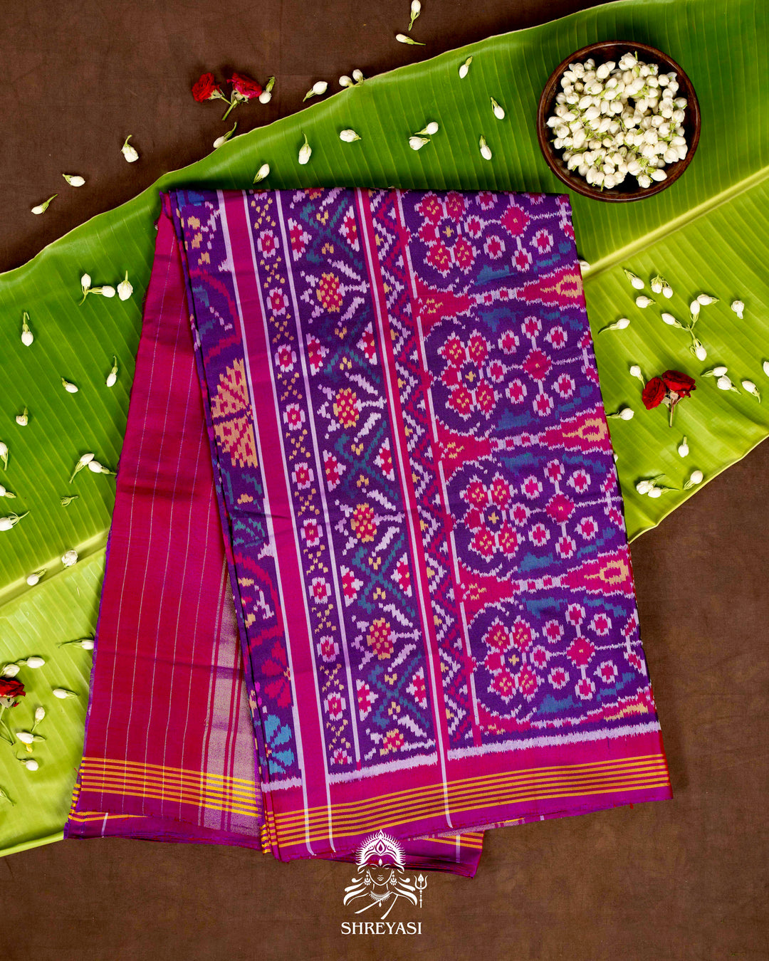 Handloom Pure Rajkot Patola Silk Saree with Animal & Floral Ikat Motifs