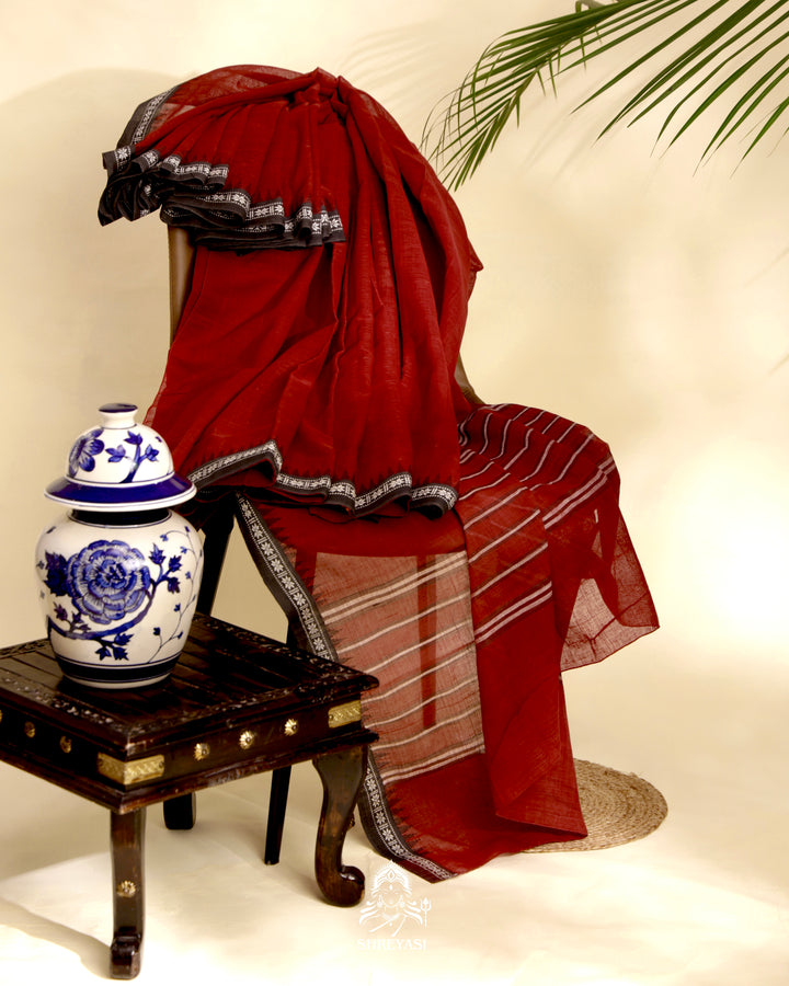 Handloom Bawan Buta cotton saree with contrast borders and a soft breathable drape