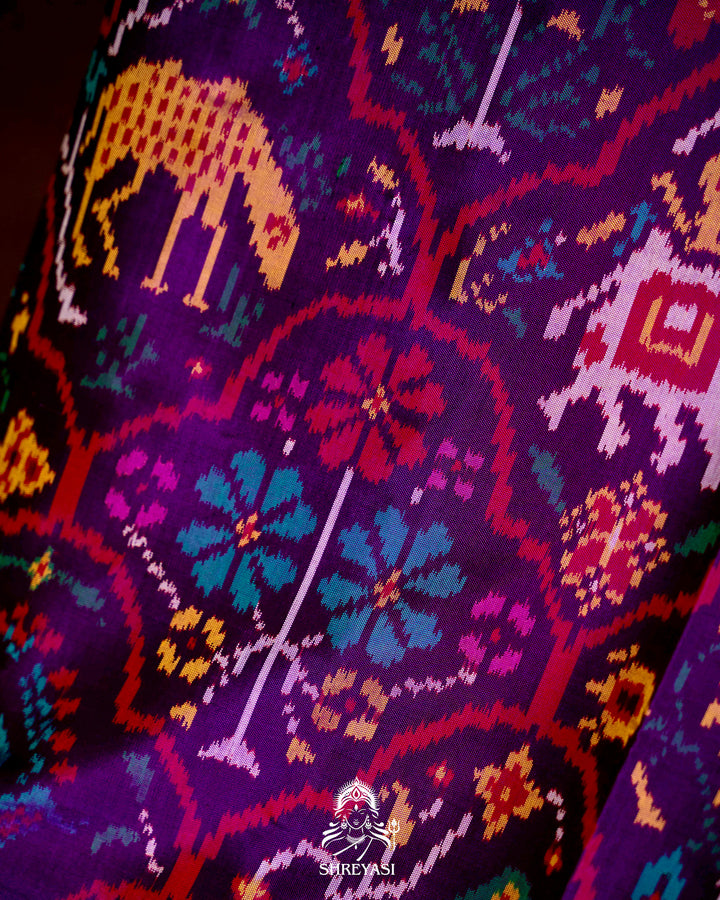Handloom Pure Rajkot Patola Silk Saree with Animal & Floral Ikat Motifs