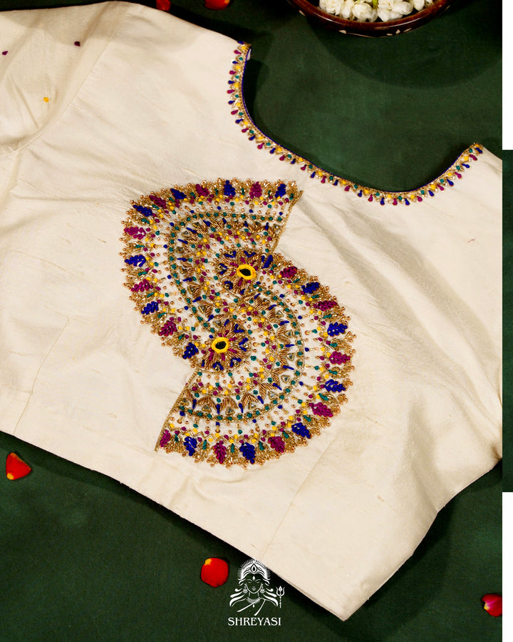 Handloom Pure Rajkot Single Ikat Patola Silk Saree with Hand-Embroidered Raw Silk Blouse