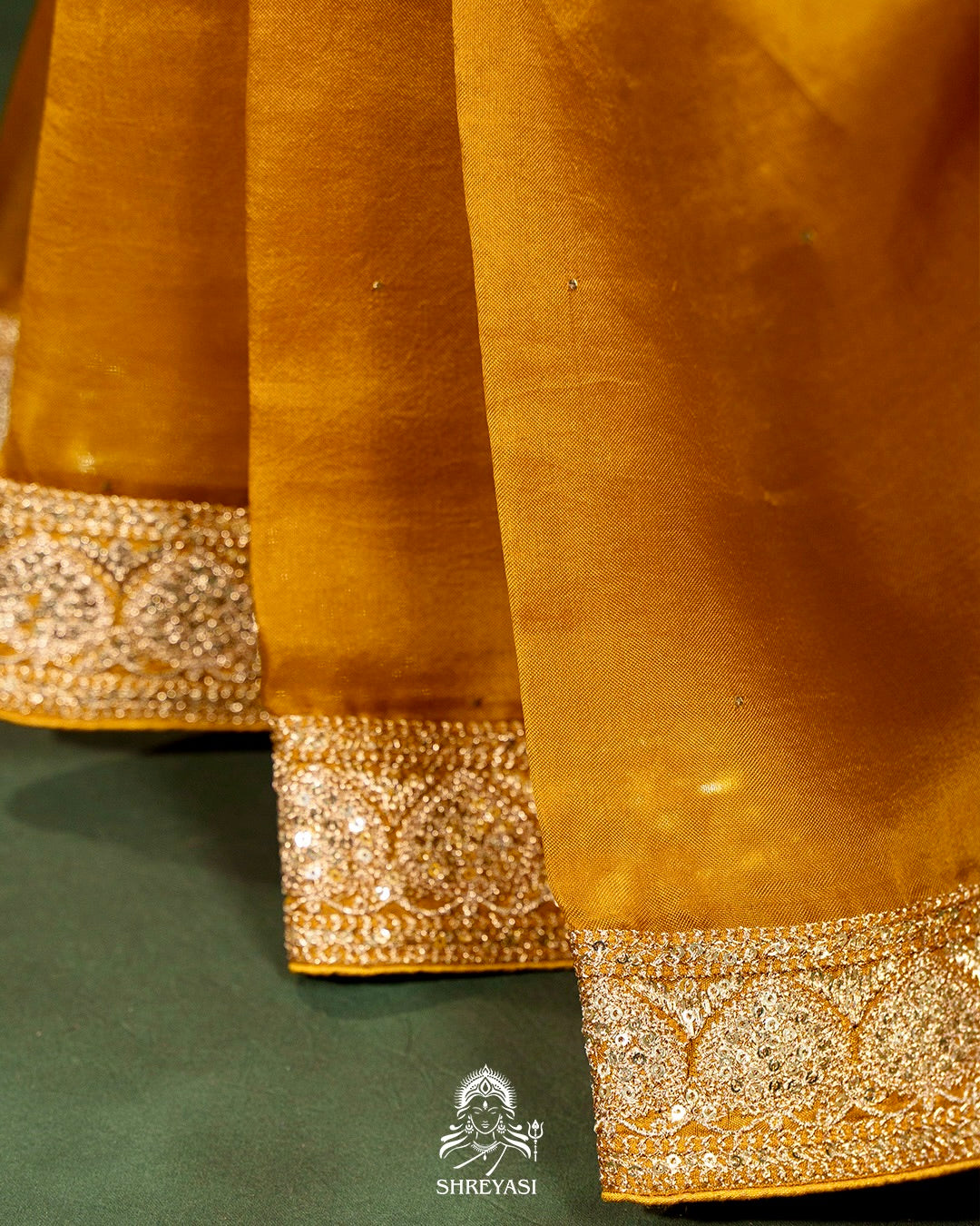 Pure Organza Silk Saree with Embellished Borders and Patola Print Silk Blouse