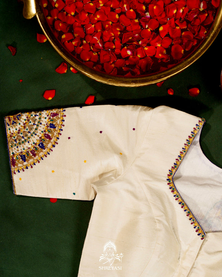 Handloom Pure Rajkot Single Ikat Patola Silk Saree with Hand-Embroidered Raw Silk Blouse