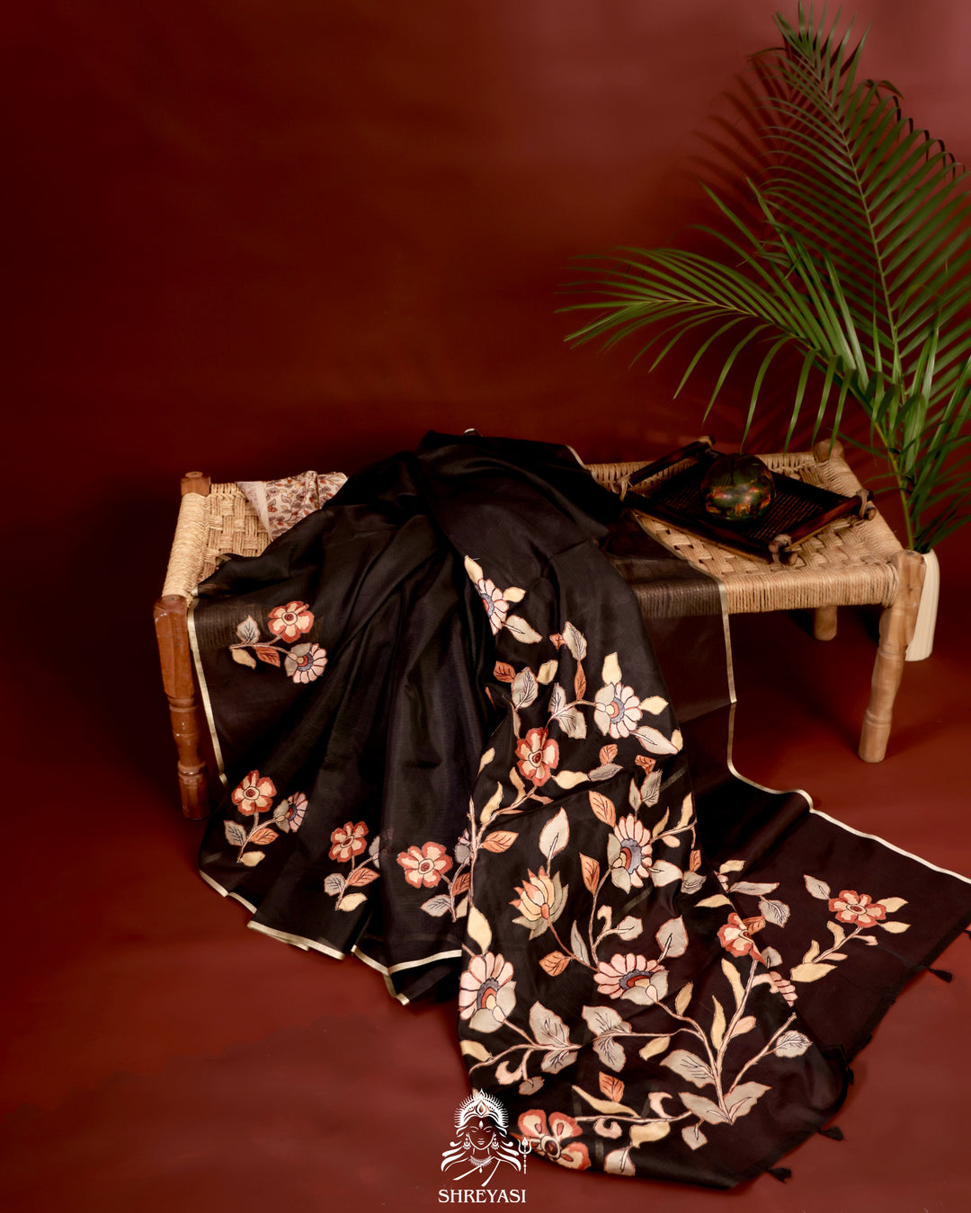Kota saree with floral kalamkari appliqué work, contrast border, and lightweight breathable drape