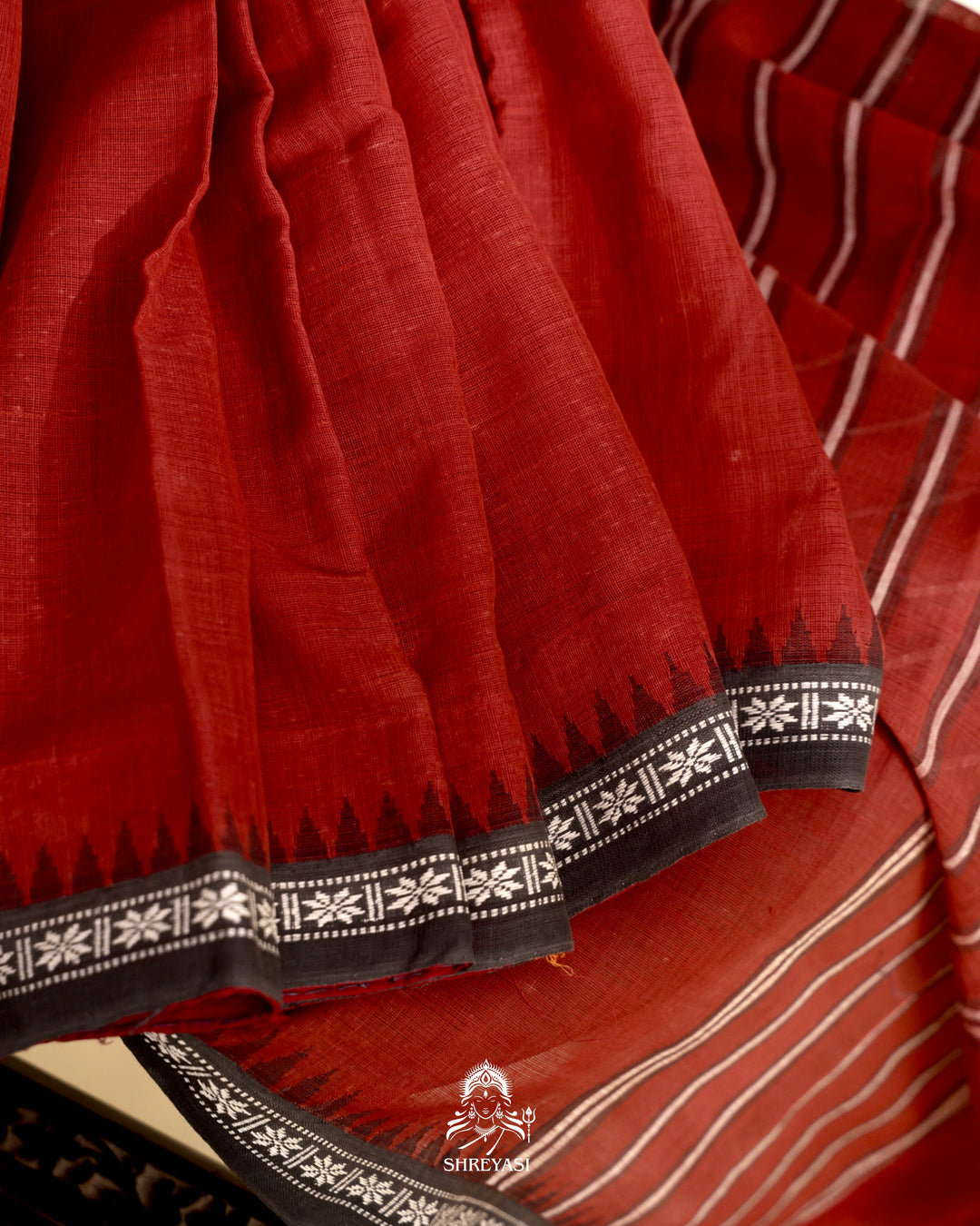 Handloom Bawan Buta cotton saree with contrast borders and a soft breathable drape