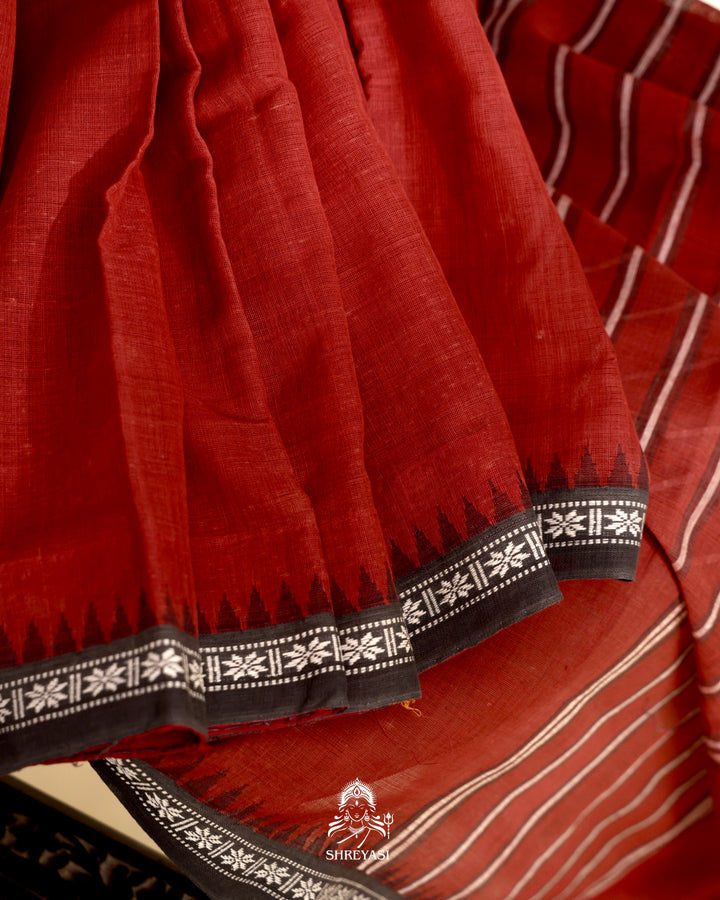 Handloom Bawan Buta cotton saree with contrast borders and a soft breathable drape