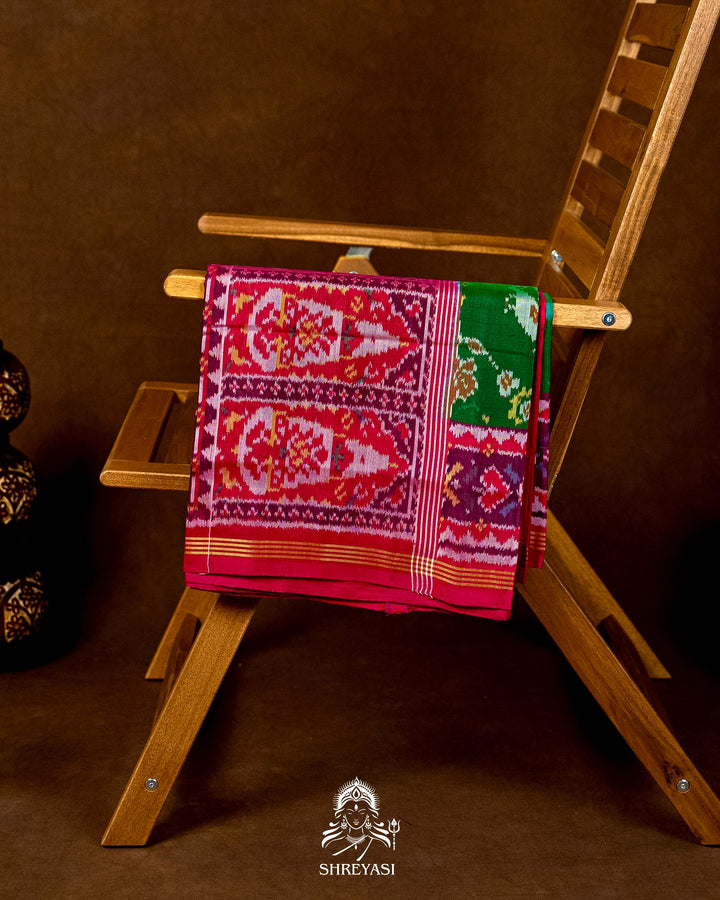 Handloom Pure Rajkot Patola Silk Saree in Emerald Green with Animal & Floral Ikat Motifs