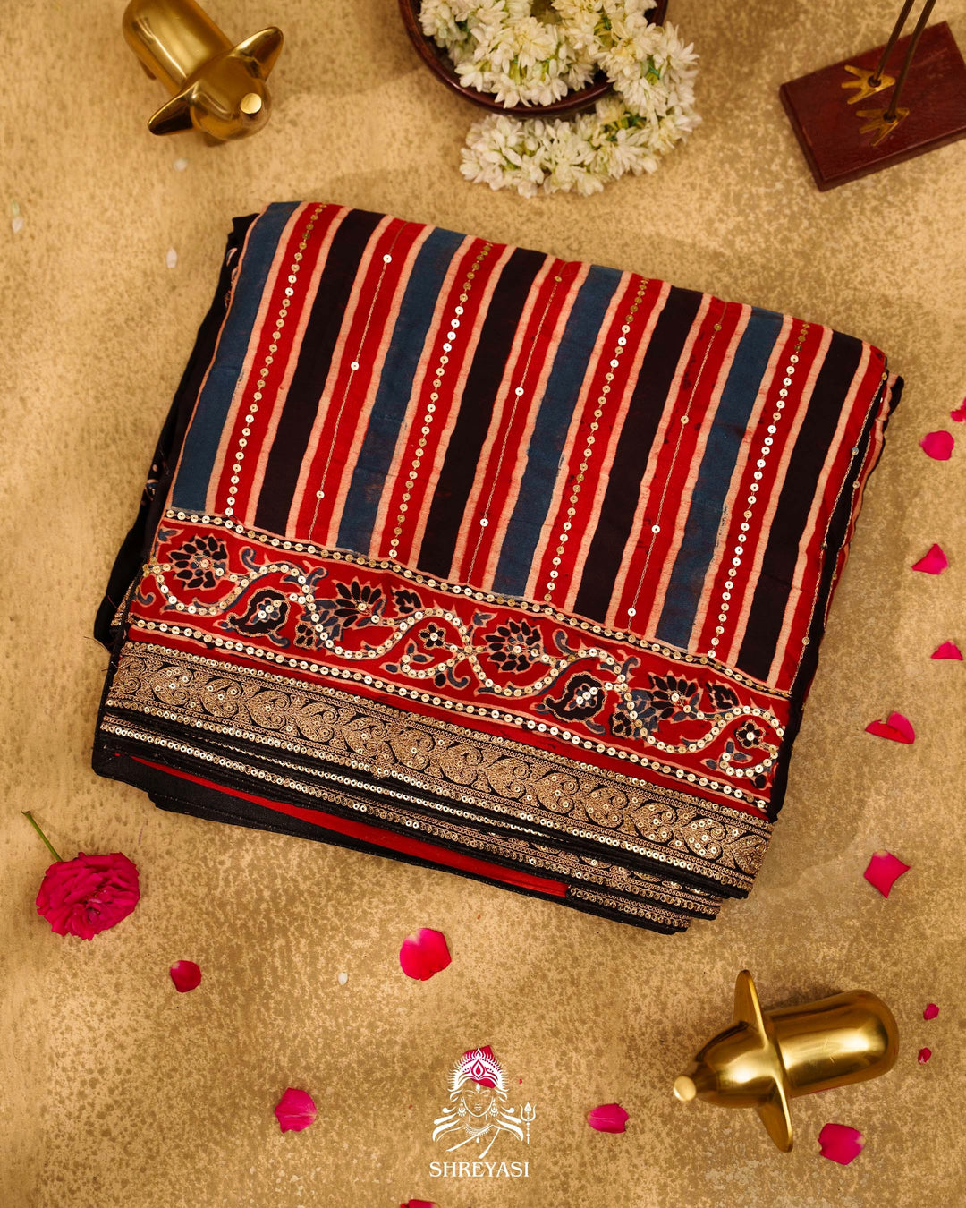 Handloom Pure Modal Silk Ajrakh Hand Block Printed Saree with Natural Dyes, All Over Aari Embroidery & Embroidered Borders