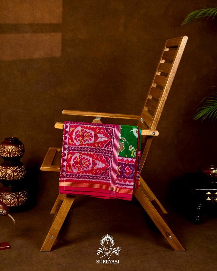 Handloom Pure Rajkot Patola Silk Saree in Emerald Green with Animal & Floral Ikat Motifs