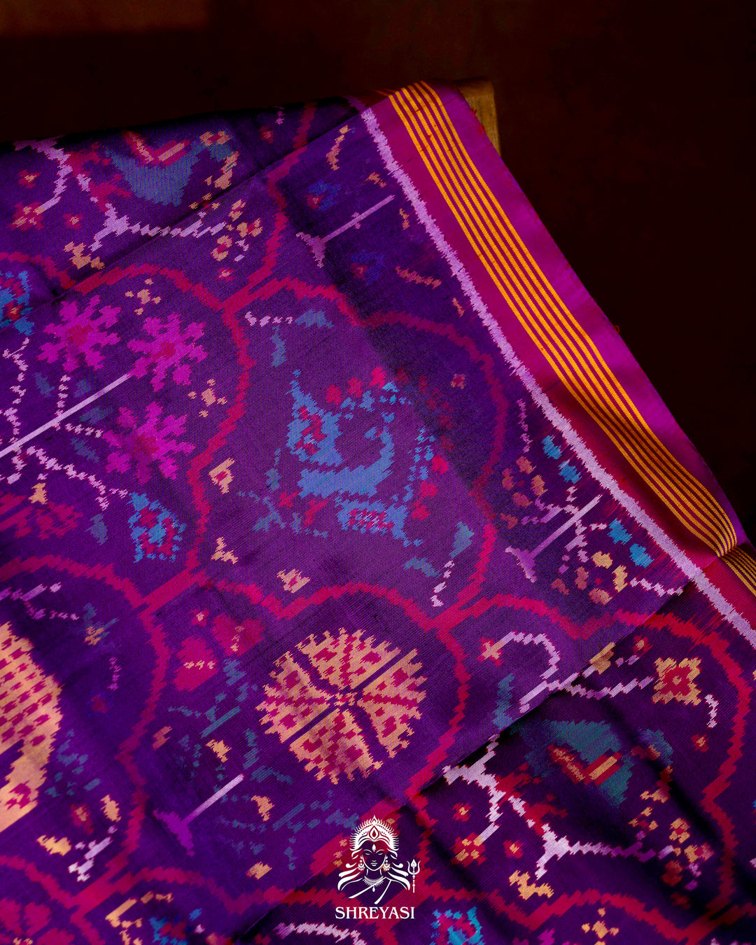 Handloom Pure Rajkot Patola Silk Saree with Animal & Floral Ikat Motifs