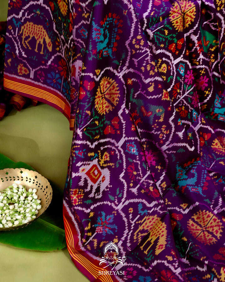 Handloom Rajkot Patola Silk Saree in Deep Violet with Multicolor Ikat