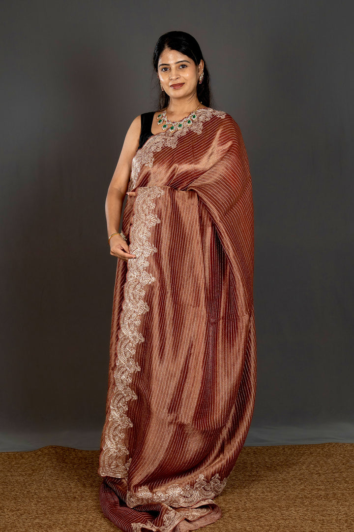 Handloom Pure Tissue Silk Saree with Pita Embroidered Borders and Paithani Pen Kalamkari Blouse