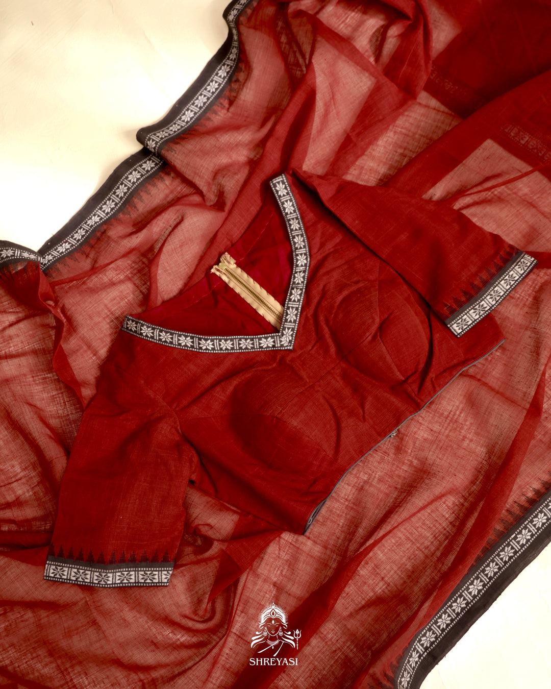Handloom Bawan Buta cotton saree with contrast borders and a soft breathable drape