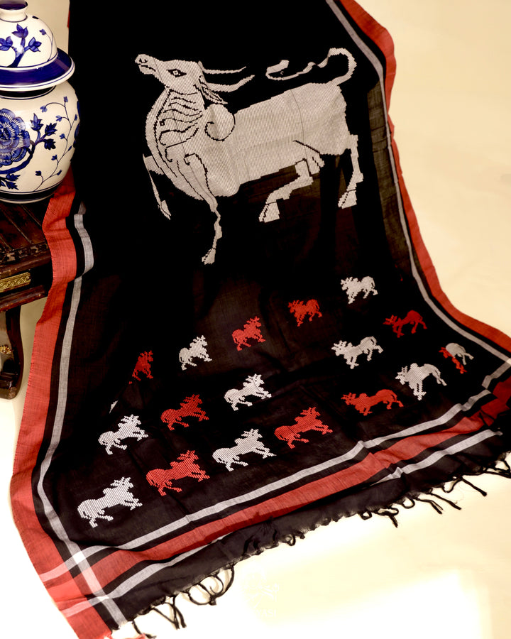 Handloom Bawan Buta cotton saree featuring traditional Jamdani woven motifs and contrast borders