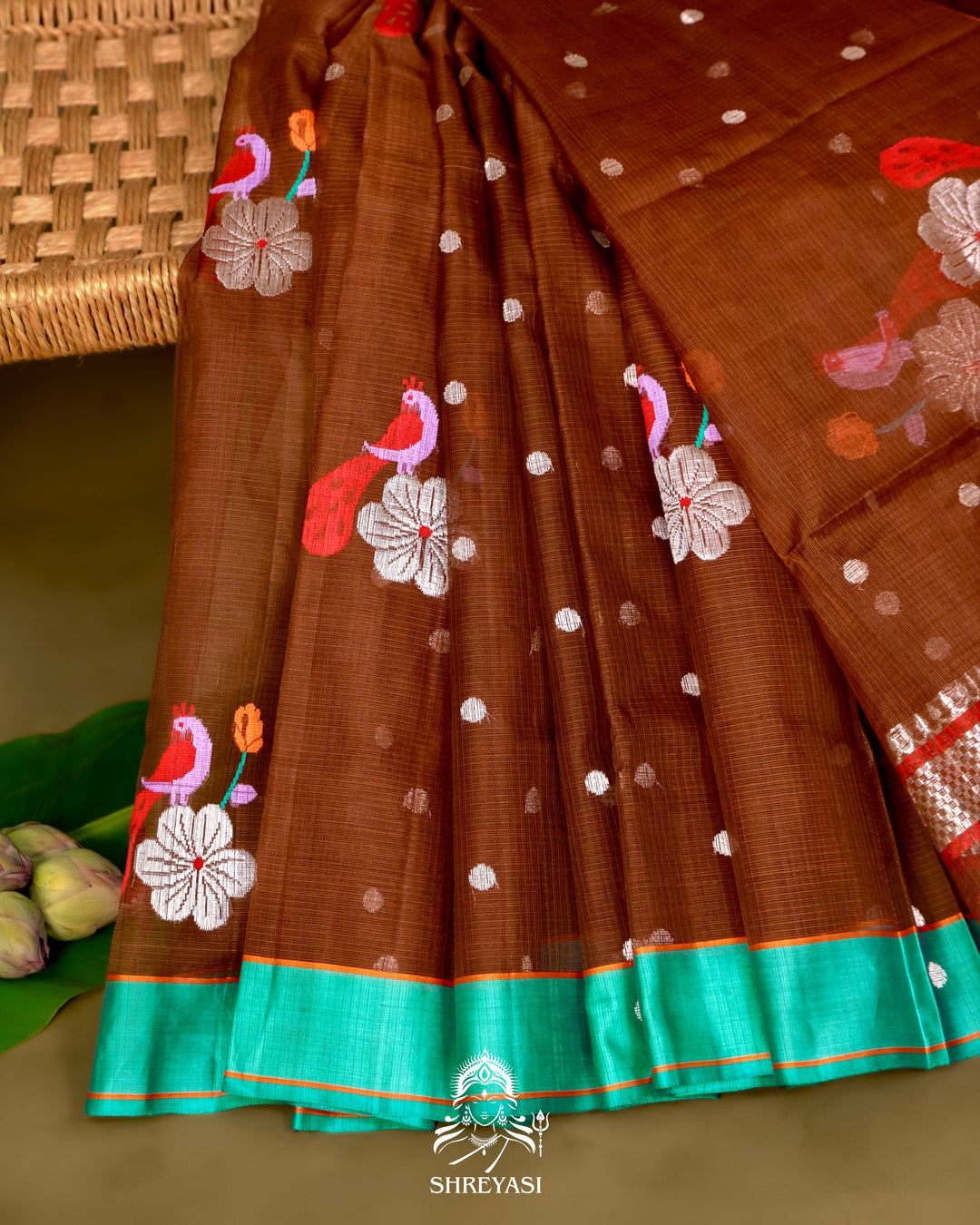 Zari Kota Silk Saree with Bird Motifs and Contrast Turquoise Blouse