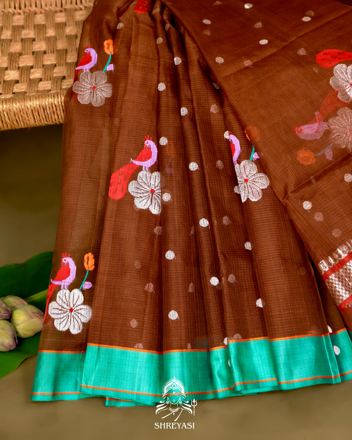 Zari Kota Silk Saree with Bird Motifs and Contrast Turquoise Blouse
